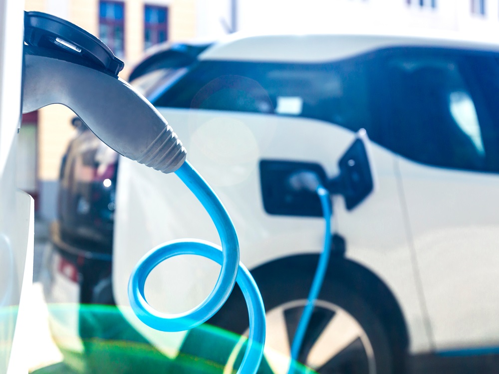 Electric car at charging station